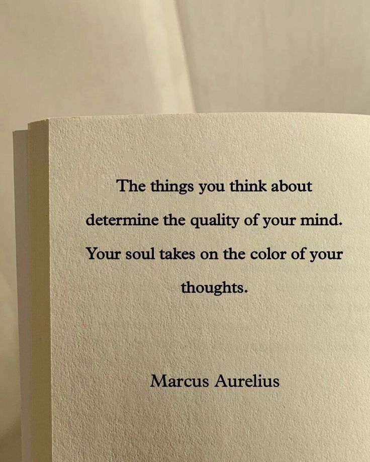 an open book with a quote on the front and back cover that reads, the things you think about determine the quality of your mind