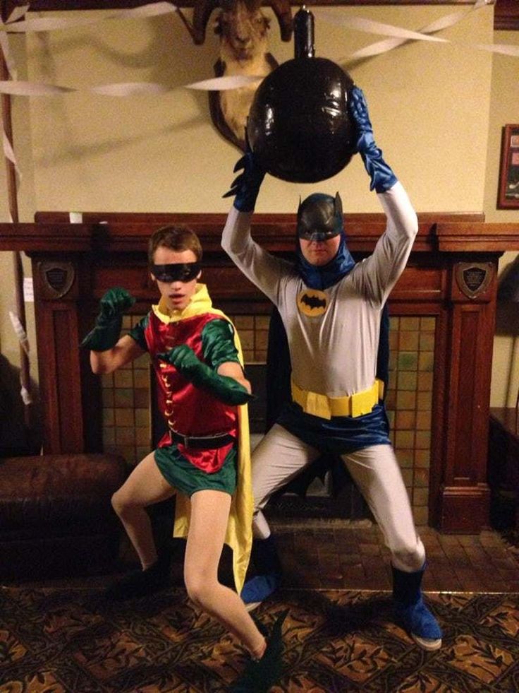 two people dressed as batman and robin wayne