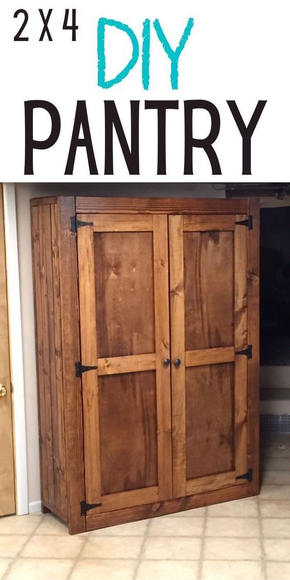 the diy pantry is made out of wood and has two doors on each side