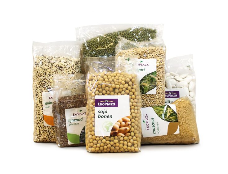 several different types of food in bags on a white background, including beans and rice