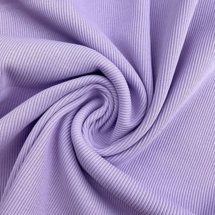 a close up view of a purple fabric