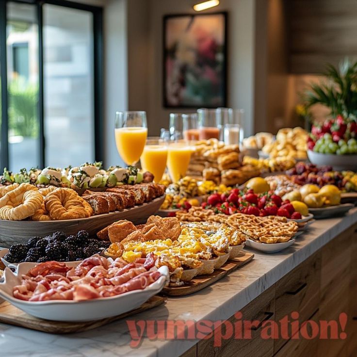 a buffet table filled with different types of food and drinks on it's sides