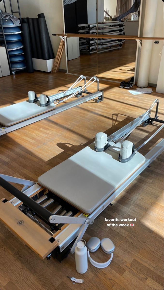 an image of a room that is being used as a coffee table and exercise equipment