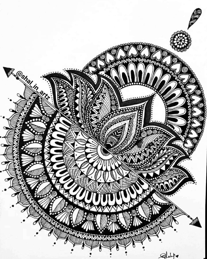 a drawing of an ornate design on white paper