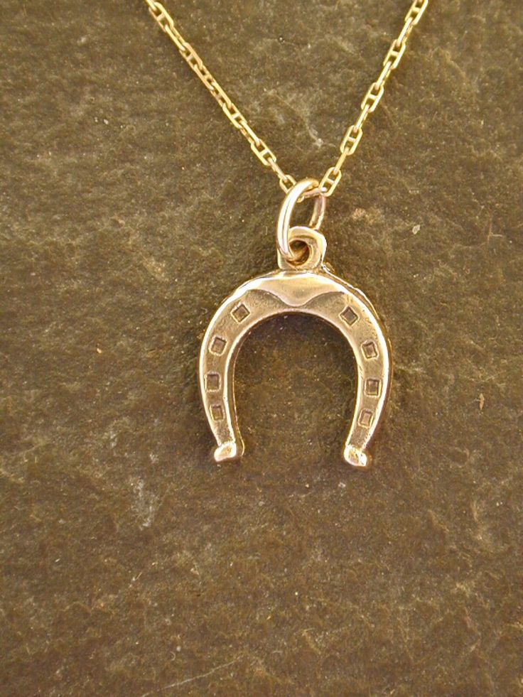 "This Horse Shoe pendant is 14K Gold. The included chain is a 14K Gold chain. You may choose 16, 18 or 20 inch at the same price. Other length available at sightly higher prices. This Horse Shoe pendant measures 5/8\" tall by 1/2\" across. I hand cast all my pieces using the lost wax casting method. Please ask your needs. You may call me with questions, often I am out so please use my machine. 831-476-3176. Satisfaction Guaranteed! I send items USPS First Class unless otherwise directed. I send Horse Shoe Pendant, Shark Pendant, Silver Shark, Dope Jewelry Accessories, Celtic Knot Pendant, Gold Horse, Horse Jewelry, Dog Pendant, Dope Jewelry