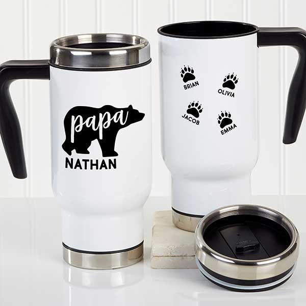 two travel mugs with the words papa and nathan printed on them, sitting next to each other