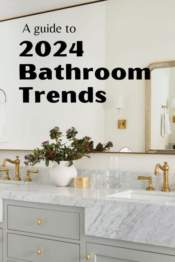 a bathroom with marble counter tops and gold faucets