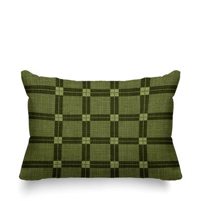 a green checkered pillow on a white background