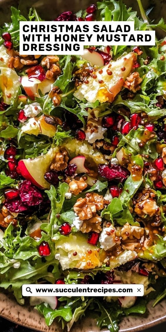 a salad with apples, cranberries and walnuts on it in a bowl