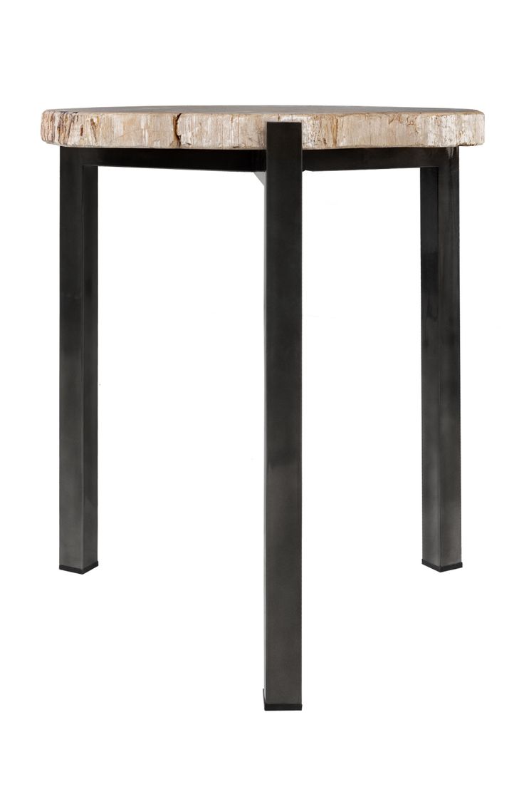 a marble top table with black metal legs