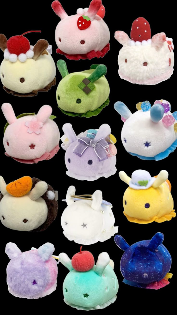 several stuffed animals with different colors and sizes