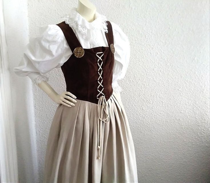 90s folk dress, prairie peasant dirndl dress, bavarian trachten traditional dress, 12 UK size, linen velvet dress, tyrolean german alpine dress, is mixed fabric : linen and faux leather. white top is not included. please check the measurements before ordering Good vintage condition but the item is not dry clean. the dress have small flaws (small stains) barely visible because of the draping of the dress. Probably will dissappear if the dress will be dry clean. measurements laying flat: shoulders :32 cm (12,5 inches) bust:42 cm (16,5 inches) waist :37cm (14,5 inches) total lenght:120cm (44 inches) Traditional German Dress, Folk Style Clothing, Dirndl Dress Traditional, German Traditional Dress, German Dress, Dirndl Dress, Folk Dresses, Mixing Fabrics, Velvet Dress