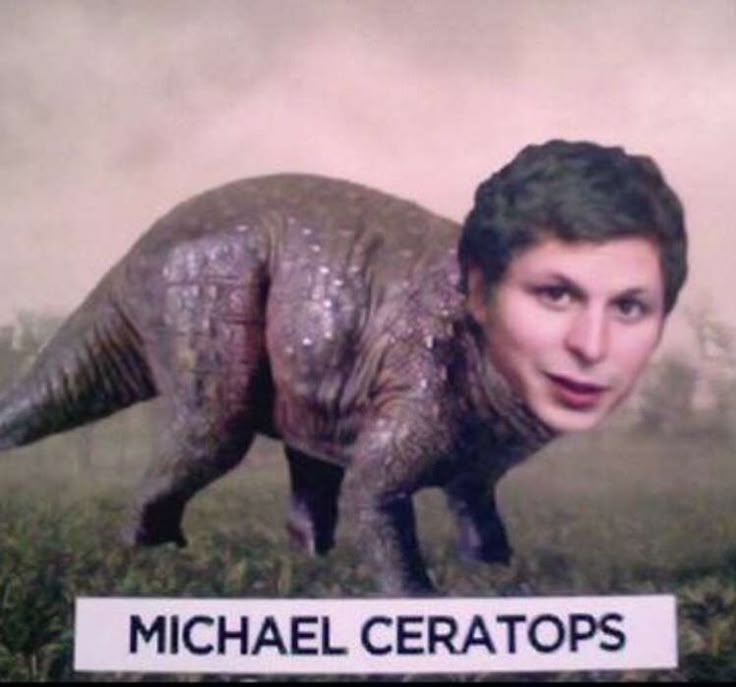 a fake dinosaur with michael ceratops on it's face and name plate