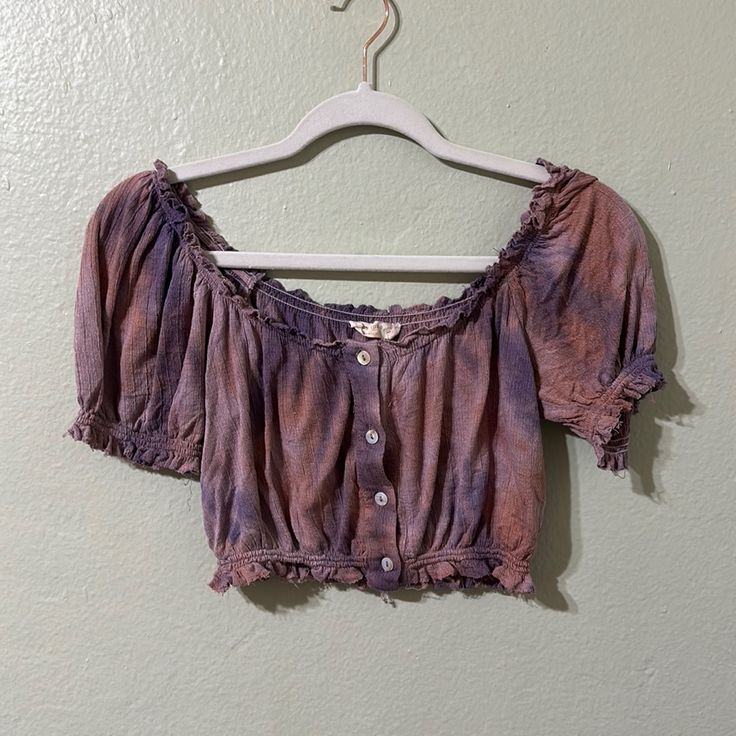 Very Unique Style. It Is Something Like A Blues, With Buttons Coming Down, A Fringed Collar, Sleeves, And Waist. Off-Shoulder As Well. Tie Dye Colors Of Purple And Pink With Shiny White-Like Buttons. Never Worn, Even Has The Button Tag Attached. Fair Offers Accepted Lavender Cropped Crop Top For Summer, Summer Purple Cotton Blouse, Purple Cotton Summer Blouse, Casual Purple Summer Blouse, Cute Purple Top For Day Out, Casual Purple Blouse For Summer, Fitted Mauve Summer Top, Fitted Mauve Top For Summer, Purple Cropped Top For Summer