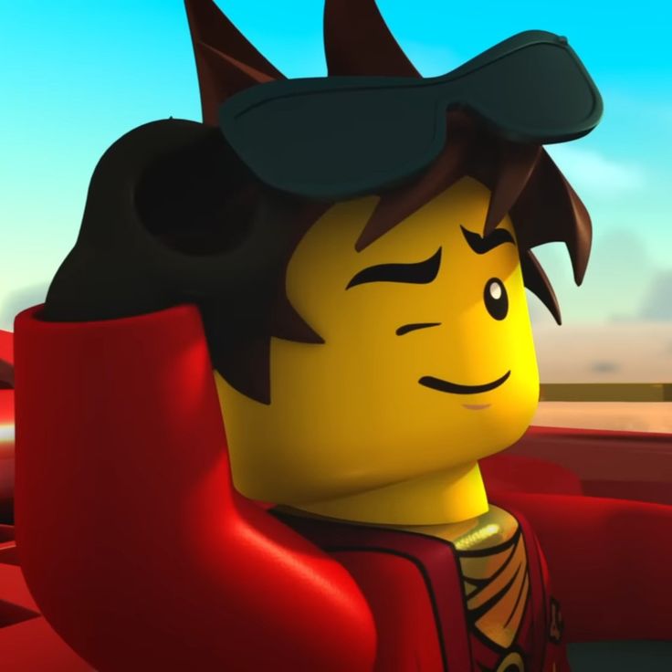 a lego character is sitting in the driver's seat with his head turned to the side