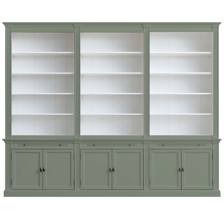 a white bookcase with three doors and two drawers