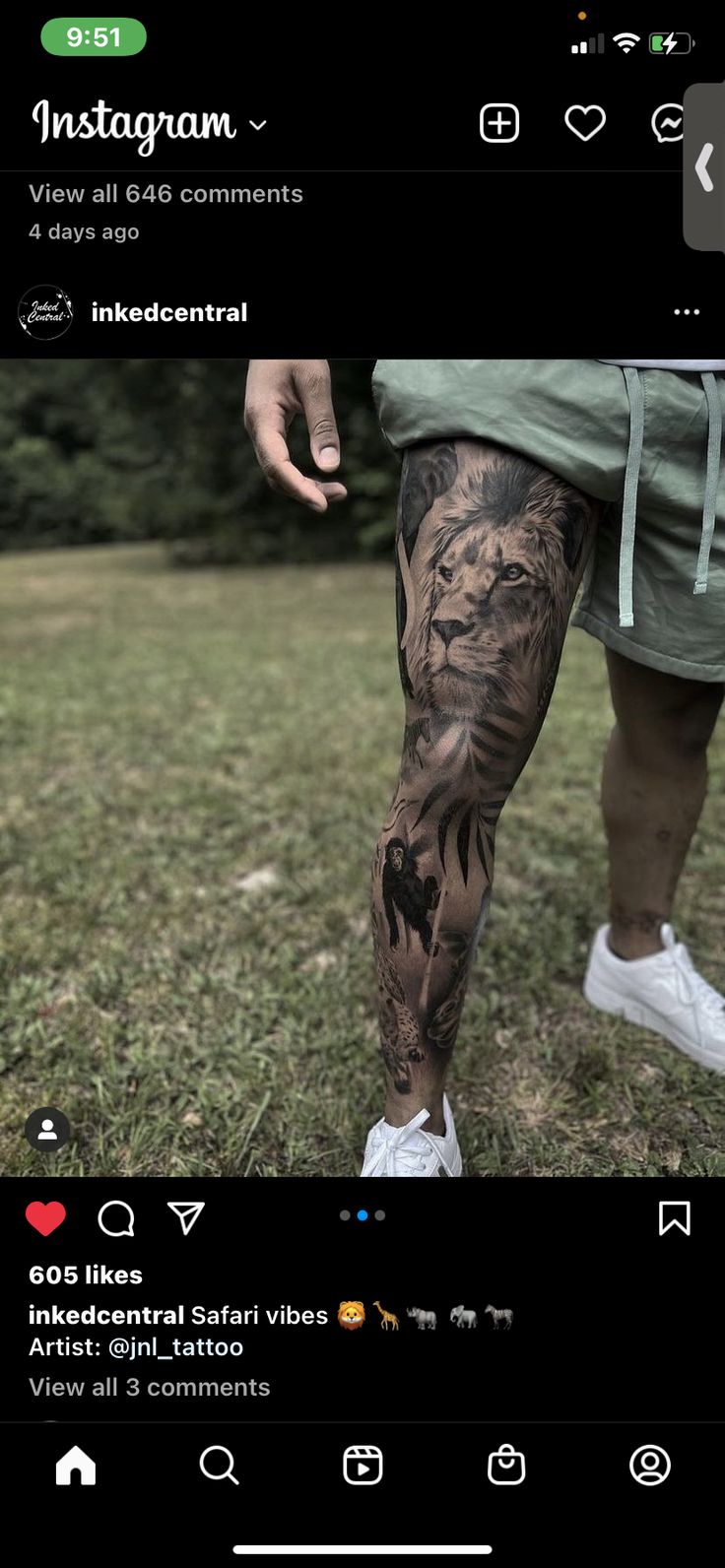 a man with tattoos on his legs and leggings is standing in the grass