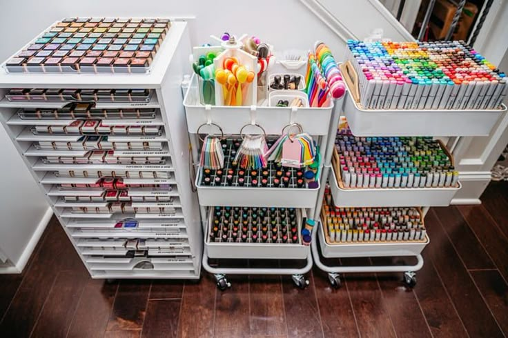 the shelves are filled with different types of art supplies