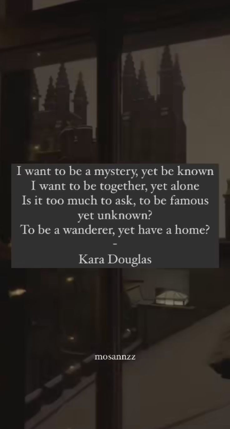 a person standing in front of a window with a quote on it that reads, i want to be a mystery yete known