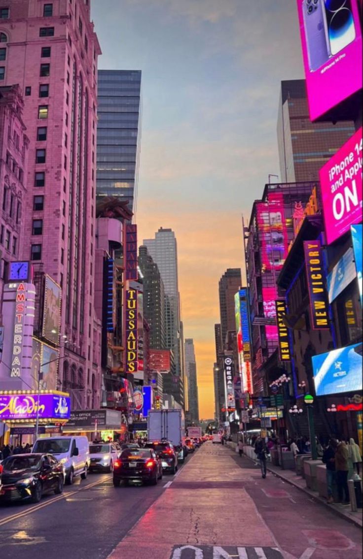 a city street filled with lots of tall buildings and neon signs at sunset or dawn