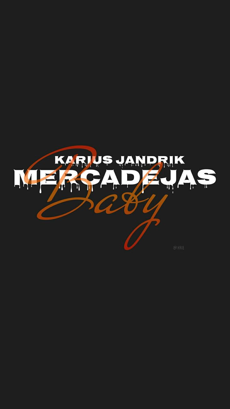 the back side of a black background with red and orange lettering