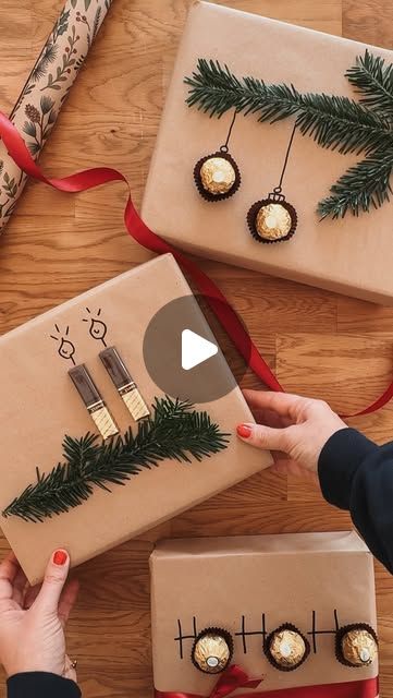 two presents wrapped in brown paper with christmas decorations on them