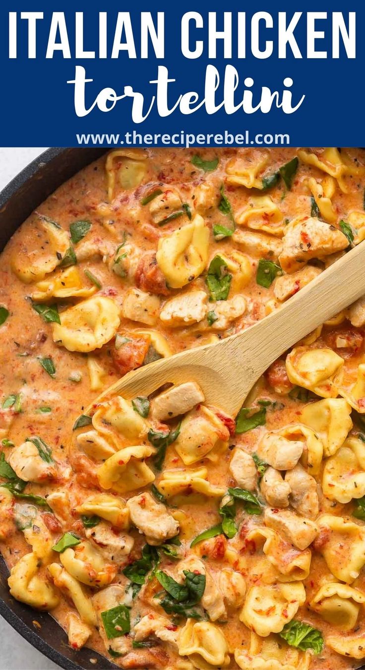 a skillet filled with chicken tortellini sauce and garnished with spinach