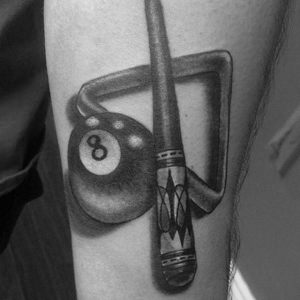 a black and white photo of a billiards tattoo on the arm