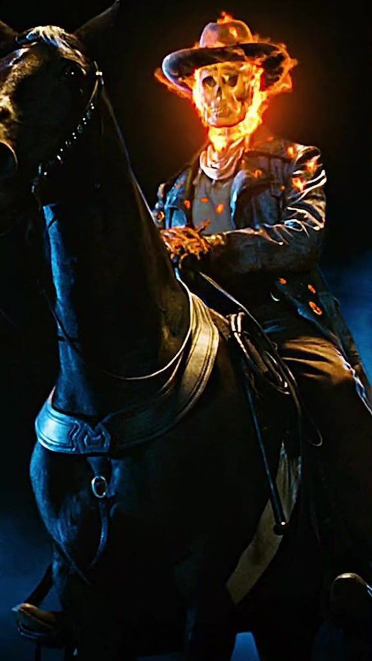 a man riding on the back of a black horse in front of a dark background