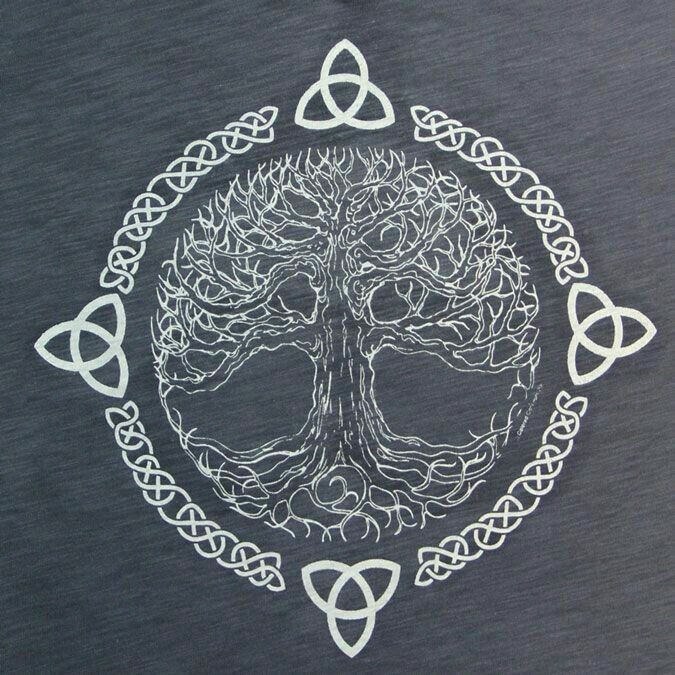 the tree of life is depicted in this t - shirt with celtic knots around it