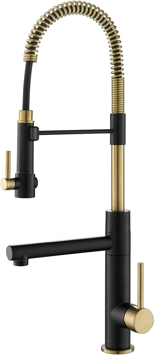 a black and gold kitchen faucet with two handles on the side, in front of a white background