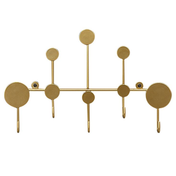 an image of a gold chandelier with five circles on each side and four dots on the middle