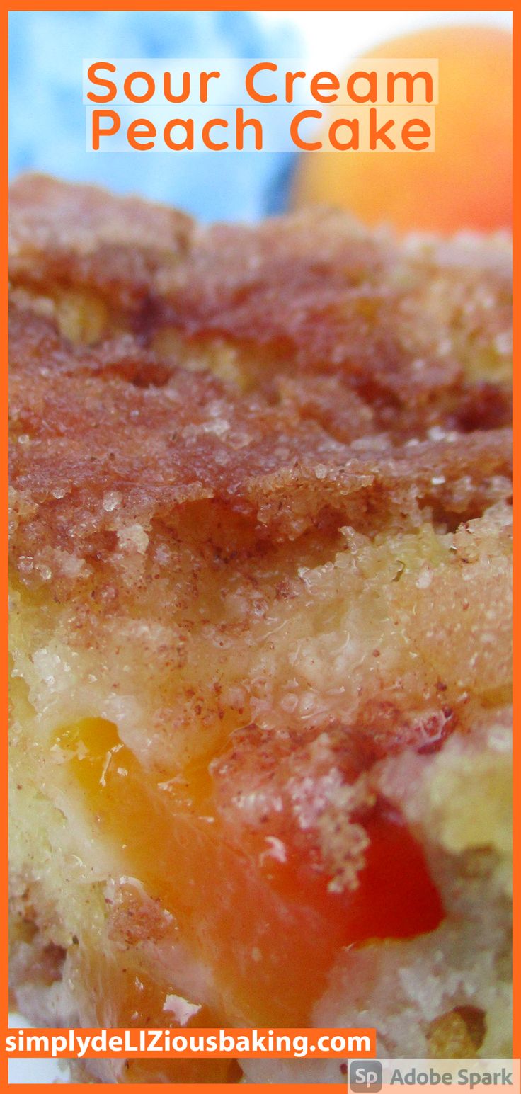 a close up of a piece of cake on a plate with the words sour cream peach cake