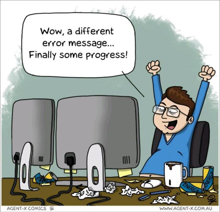 a man sitting in front of two computer monitors with his arms up, and the caption below reads wow, a different error message finally some progress