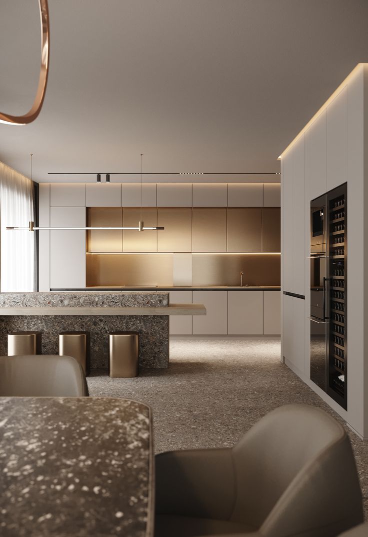 a modern kitchen with marble counter tops and stainless steel appliances