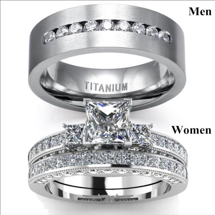 two white gold wedding rings with princess cut diamonds and channel set diamond bands on each band