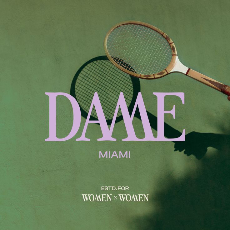 a woman holding a tennis racquet on top of a green wall with the word'dame '