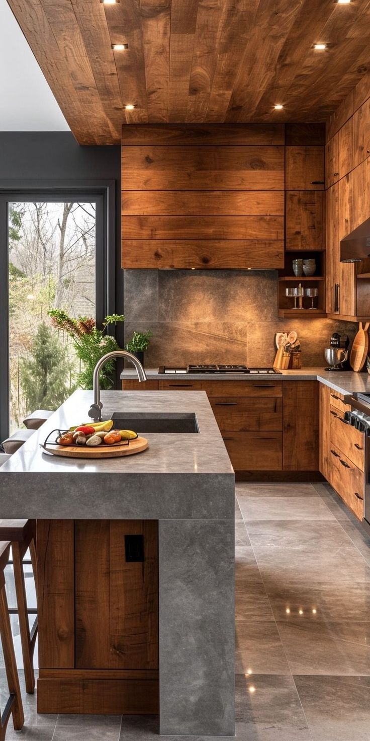 a kitchen with wooden cabinets and an island countertop in the middle of the room