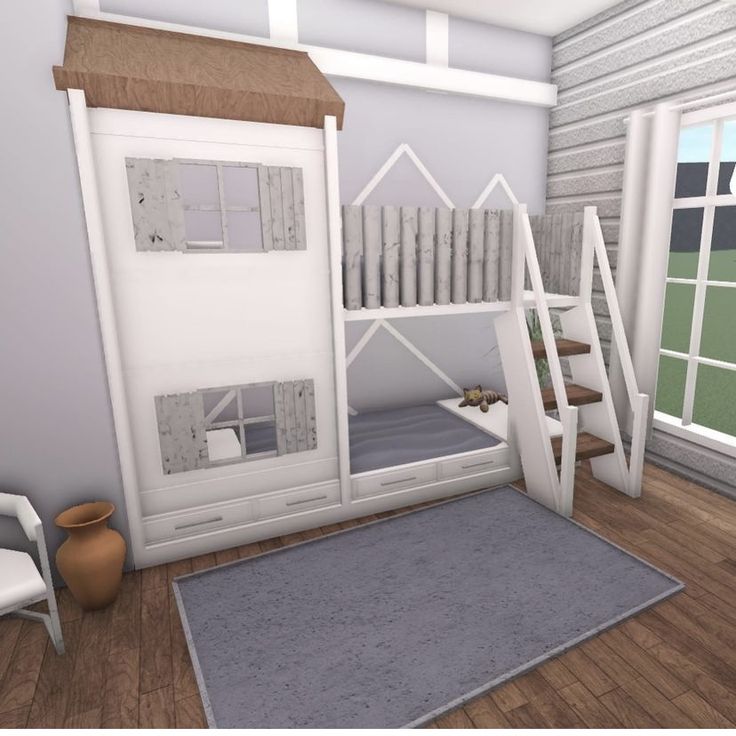 a white bunk bed sitting next to a window