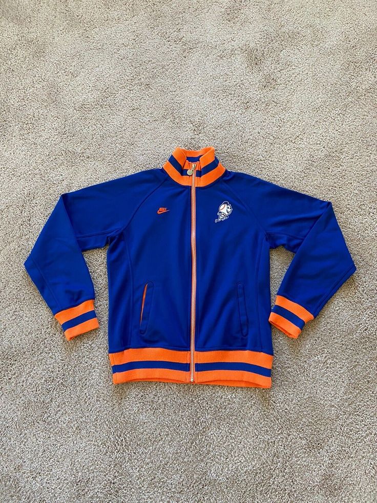 Vintage Nike Blue Orange Jacket, Size M. It shows normal signs of use, with no noticeable flaws. Fits true to size on me and I usually wear size M. Length approx.23”, bust 19”, sleeve from armpit to cuff 20”. Two side pockets, unlined. Real color is lighter than shows in the pictures. 100% polyester. Policies: 1. Any questions please please ask before bidding! 2. Paypal only, US shipping only! 3. Serious bidders please!!!! Payment is due in 2 days after the auction ends. If I don't receive your payment in 2 days, I will file a dispute. 4. Items usually are shipped out in 1-2 days after receiving clear payment. 5. I provide measurements to every item. Buyers are responsible to lock at the measurements and compare to their own garments before bidding. All of my measurements are taken while t Orange Jacket, Nike Blue, Brands Outlet, Vintage Nike, Blue Orange, Vest Jacket, Vintage Ladies, Vintage Outfits, Things To Sell