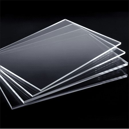 four clear plastic sheets stacked on top of each other in front of a black background