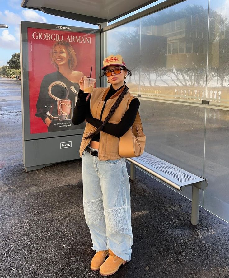 VTG Carhatt Vest 🤎✨🤎. Tap the “VINTAGE” tab on our site to shop our one-of-a-kind selections #coalnterryvintage Outfits With Vests For Women, Vest Jacket Outfit, Tan Puffer Vest, Timberlands Outfit, Puffy Jacket Outfit, Puffy Vest Outfit, Gray Midi Skirt, Cool Pose, White Crew Socks