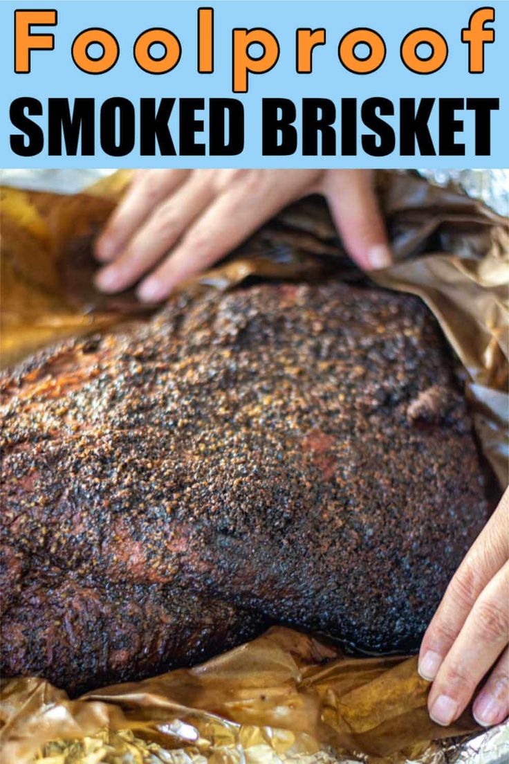 two hands touching the top of a smoked brisket on foil with text overlay