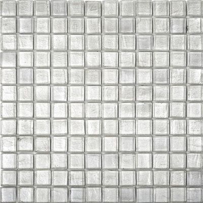 a white tile wall with square tiles on the bottom and one side in grey tones