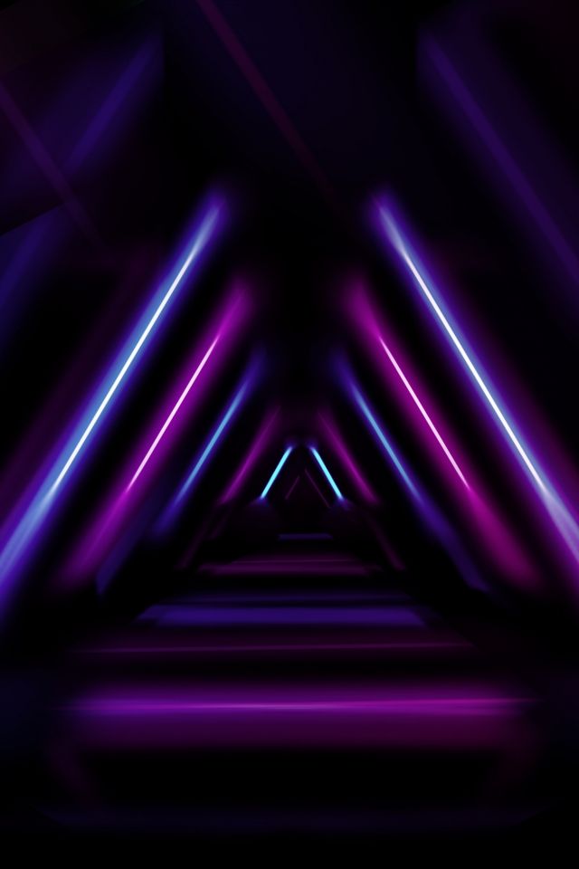 an abstract purple and black background with neon lights in the dark, that is very colorful