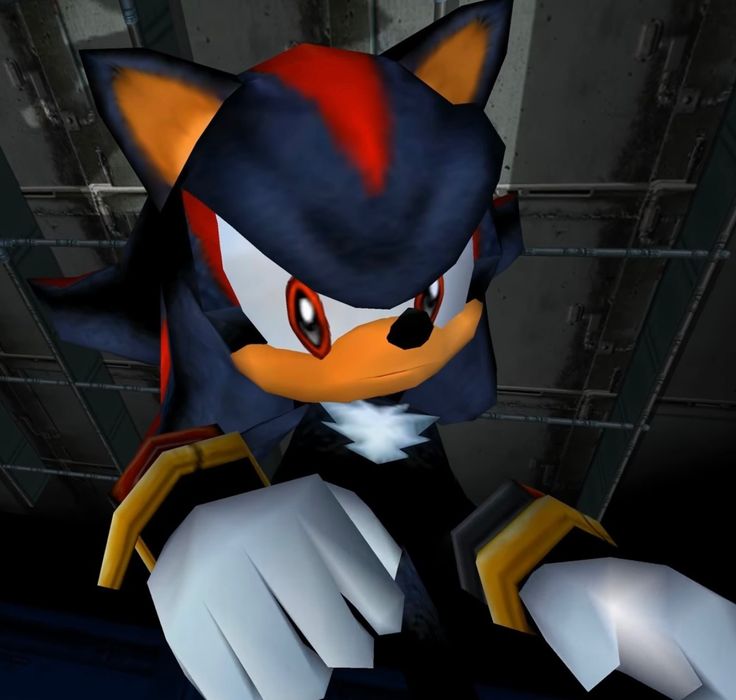 an animated image of a sonic the hedge character in a dark room with his hands on his hips