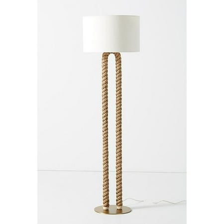 a rope lamp with a white shade on it