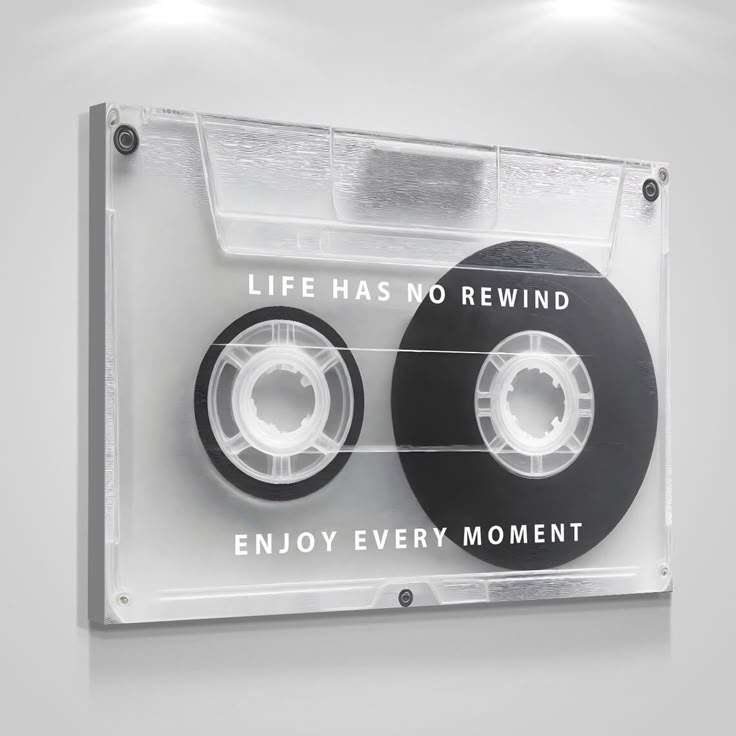 two cassette tapes with the words life has no rewind and enjoy every moment