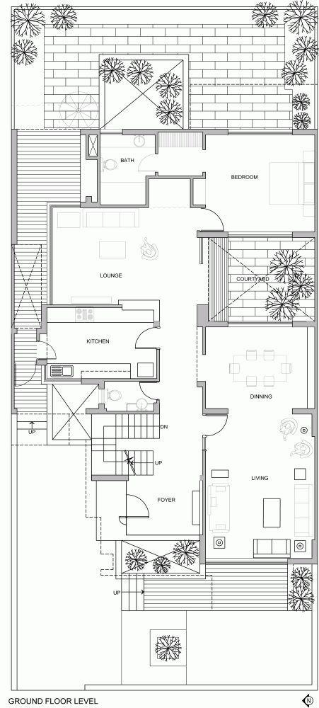 the floor plan for a house with two levels and an open living room, dining area and