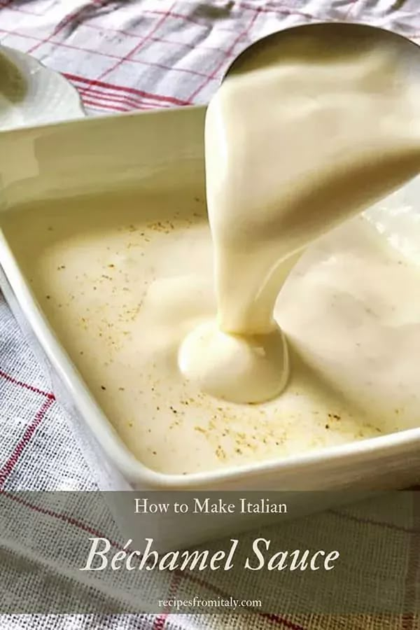 a spoon pouring cream into a dish on top of a cloth covered tablecloth with the words how to make italian bechamel sauce